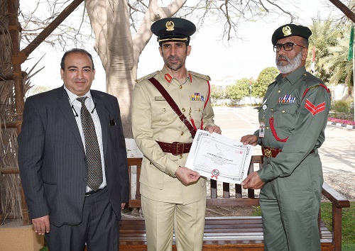 Major General Al Marri honors a policeman, promotes him for integrity and sincerity 